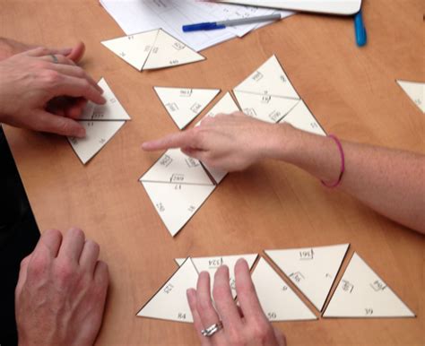 Engaging Math: Tarsia Puzzle Squares and Square Roots