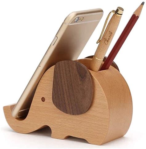 Bring some elefun to your desk with this wooden phone holder and desk ...