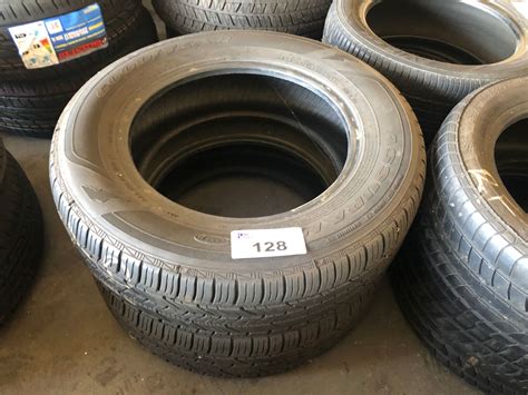 PAIR OF GOODYEAR 215/65R16 M+S TIRES - Able Auctions