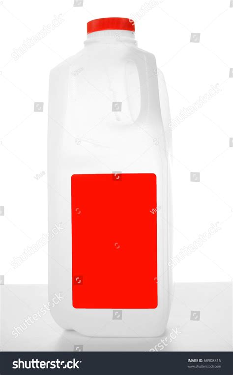 Milk Carton With Red Label On A Shiny Table With White Background. 1 ...