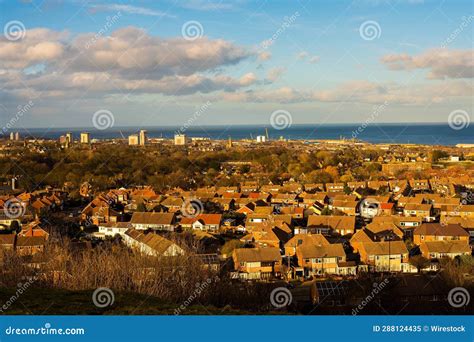 Aerial View of a Suburban Area Near a Large City with a Sea in the ...