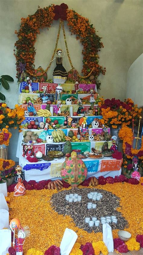 the altar is decorated with flowers, candles and other things to be ...