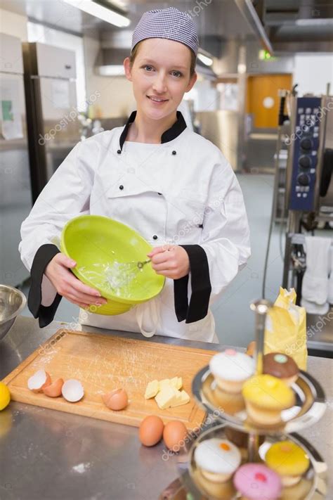 Pastry chef whisking egg whites — Stock Photo © Wavebreakmedia #23109112