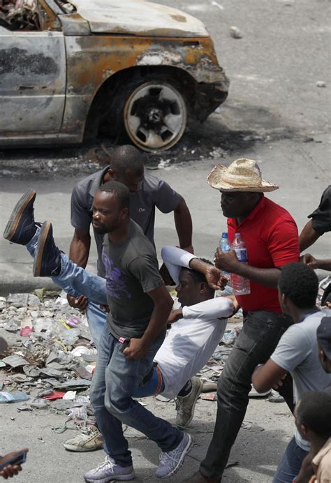 Thousands rally against Haitian president, clash with police