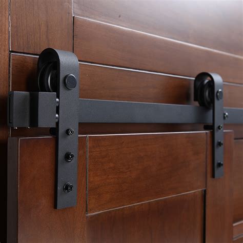 Integrate cabinet barn door hardware into your house design