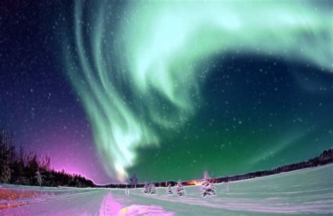 Aurora Borealis, the colored lights seen in the skies around the North ...