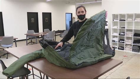 Non-profit makes and delivers coats that convert into sleeping bags for ...