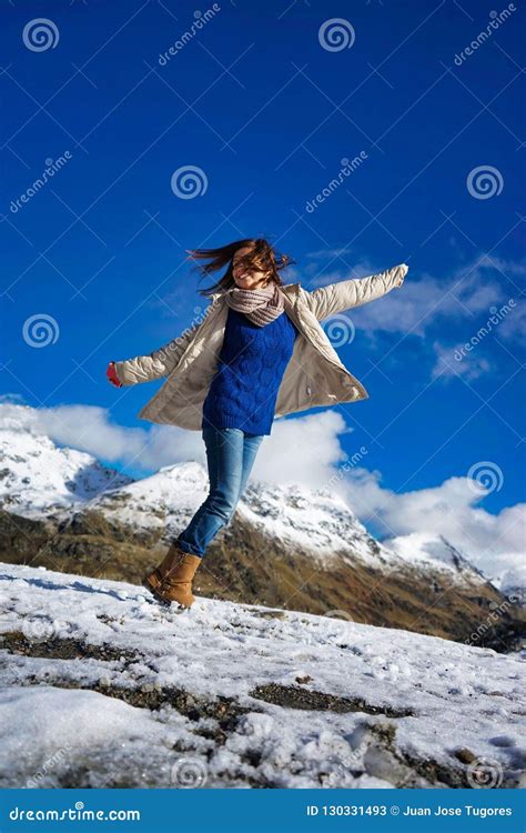 Woman on a mountain stock image. Image of landscape - 130331493