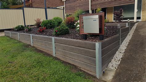 Ridgi Ironbark concrete sleeper & steel post retaining wall. For more ...