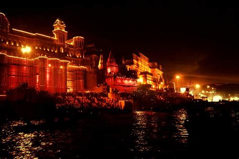 Varanasi ghats at night Photograph by Nilu Mishra