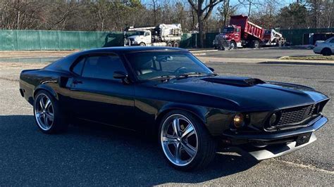 Drive Off In This 1969 Ford Mustang SportsRoof Coupe Restomod