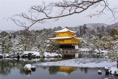 Premium Photo | Snowy kinkakuji temple in winter famous tourist ...