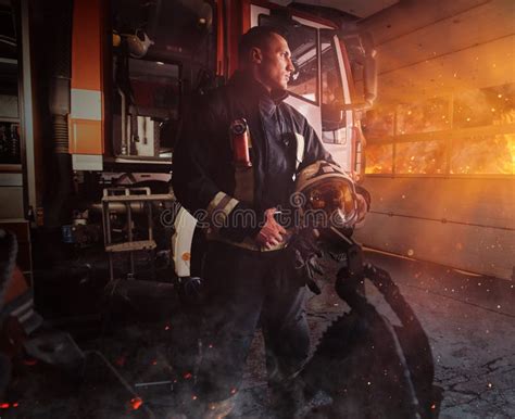 Brave Fireman Posing Around Fire Truck Indoors Fire Station Stock Photo ...