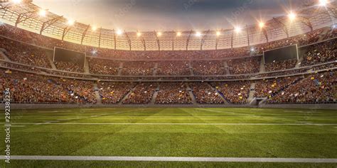 A profesional american football arena. Stadium and crowd are made in 3d ...