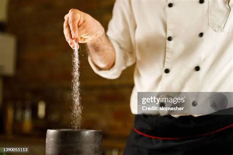 Chef Sprinkle Salt Photos and Premium High Res Pictures - Getty Images