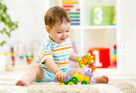 When Do Babies Start Holding & Playing With Toys?