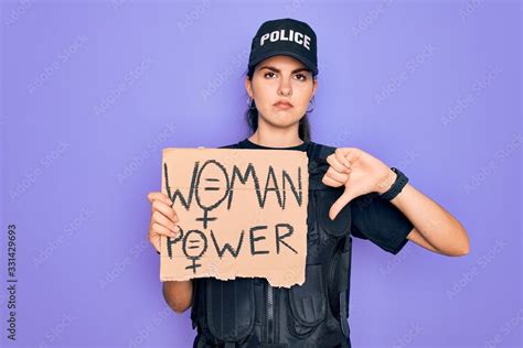 Police woman wearing security bulletproof vest uniform holding woman ...