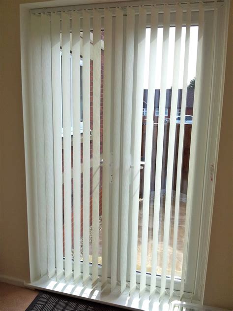 Vertical blinds in a patio door... | Patio door blinds, Door blinds ...