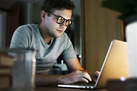 Man working on laptop - ANLX