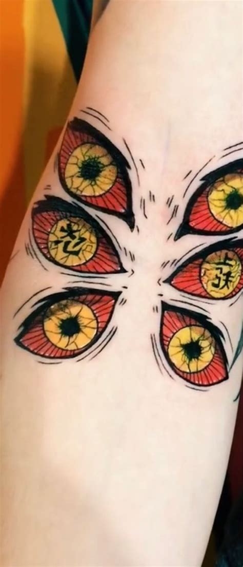 an eyeball tattoo is shown on the side of a woman's arm and leg