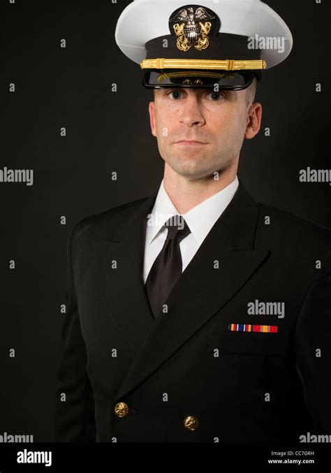 United States Navy Officer in Service Dress Blues Uniform with ...