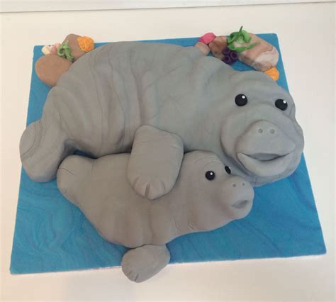 Manatee cake | Dinosaur stuffed animal, Manatee, Baby shower cakes