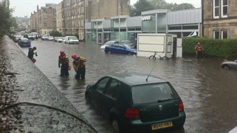 Homes and cars flooded in Edinburgh downpour - BBC News