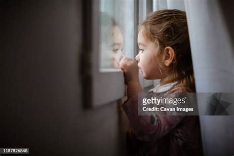 2,910 Sad Girl In Window Stock Photos, High-Res Pictures, and Images ...