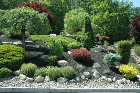 rock garden on hillside | Rock garden, Rock garden design, Rock garden ...