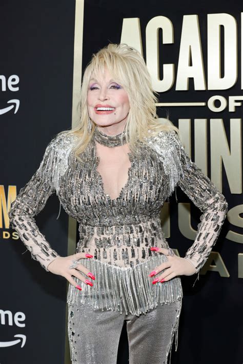 Dolly Parton Sparkles at ACM Awards 2023 in Silver Beaded Sleeves