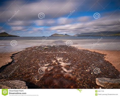 River at the beach stock photo. Image of dingle, ocean - 59017726