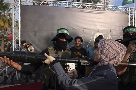 In first, Hamas encourages Gazans, including children, to pose with its ...