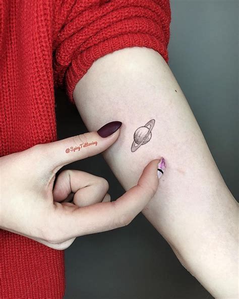 saturn plane mini tattoo | Planet tattoos, Saturn tattoo, Tattoos