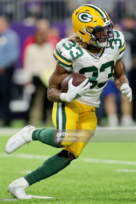 Running back Aaron Jones of the Green Bay Packers carries the ball ...