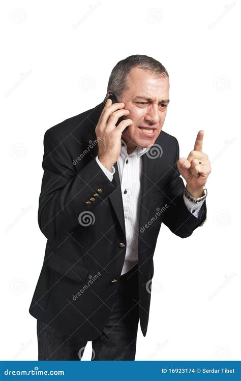 Angry Businessman Talking On The Phone Stock Images - Image: 16923174