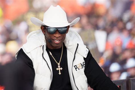 Deion Sanders shades Jay Norvell, hangs with The Rock pregame