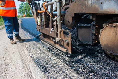 Workers on a Road Construction Stock Image - Image of equipment ...