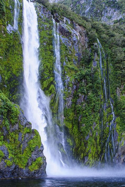 Huge waterfall in Milford Sound, Fiordland National Park, UNESCO World ...