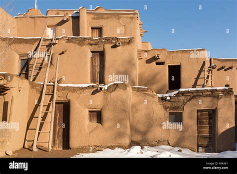 Ancient adobe homes in the ancient Native American Taos Pueblo ...