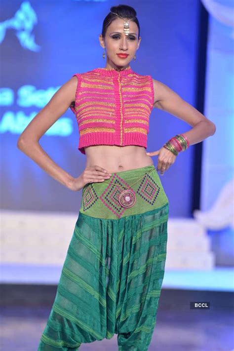 A model walks the ramp for NIFT Mumbai's fashion show, held in Mumbai ...