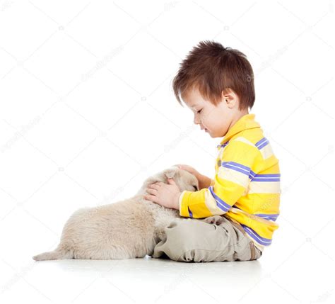 Smiling child hugging a puppy — Stock Photo © oksun70 #11953800