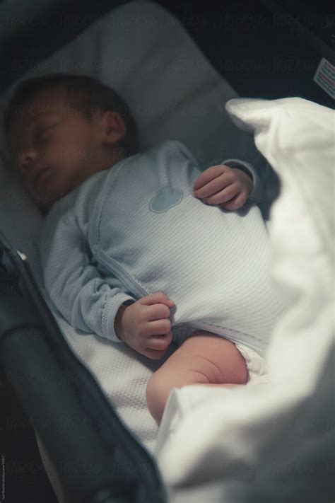 "Newborn Baby Boy Sleeping In A Bassinet" by Stocksy Contributor "Ivan ...