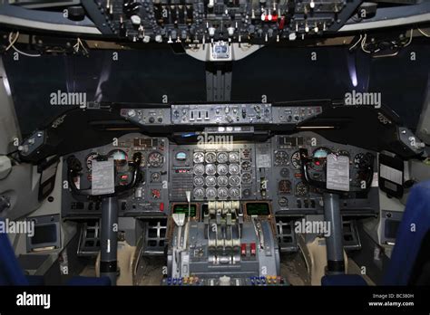 Cockpit of a Boeing 747 Jumbo jet in a maintenance hanger Stock Photo ...