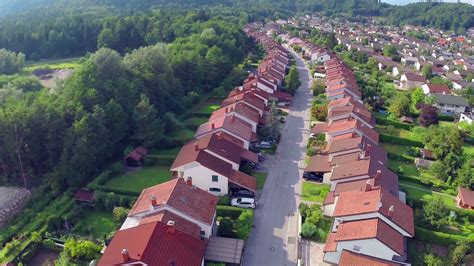 Curved Street With Suburban Houses from Aerial. Flying over suburban ...