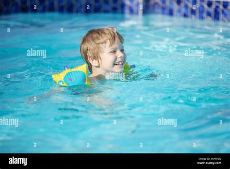 Child floaties hi-res stock photography and images - Alamy