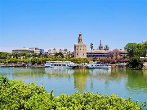 Guadalquivir River In Seville Photograph by Karol Kozlowski