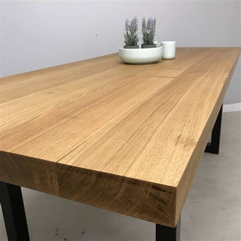 'block' solid oak dining table by revive joinery | notonthehighstreet.com