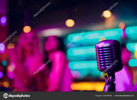 Microphone on stand up comedy stage with reflectors ray, high contrast ...