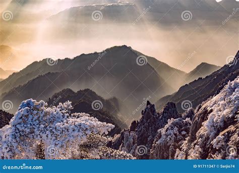 Sunrise Above the Peaks of Huangshan National Park. Stock Image - Image ...