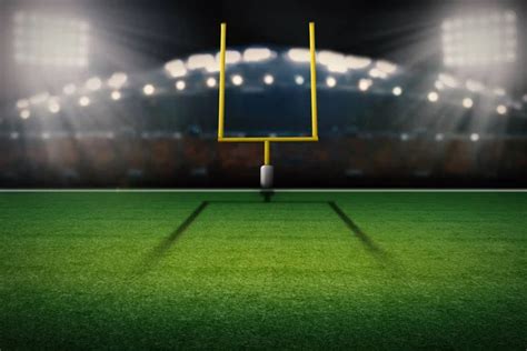 Empty football field with spotlight at night — Stock Photo © razihusin ...